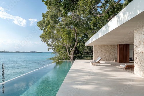 Contemporary oceanfront mansion with panoramic elevated views