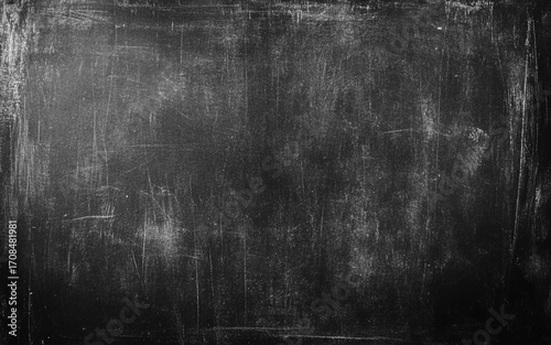 Chalk rubbed out on blackboard background. 