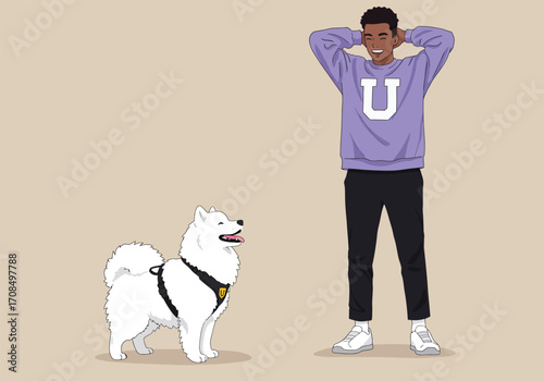 A smiling black man in a purple sweatshirt with a white u and black pants stands next to a white samoyed dog with a harness, against a tan background, showcasing a happy pet owner