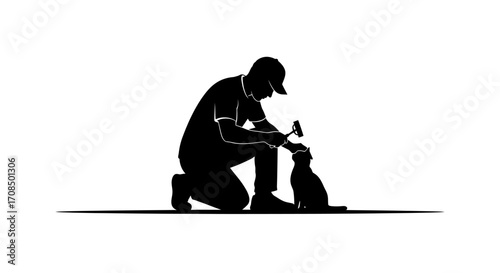 Man in cap kneeling feeds cat from hand, simple silhouette conveying warmth and companionship