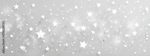 Light gray background speckled with many small white stars