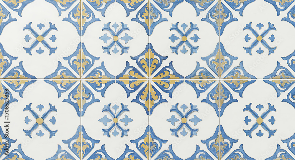 Fototapeta premium A seamless pattern of intricate Moroccan tiles in blue and yellow on a white background