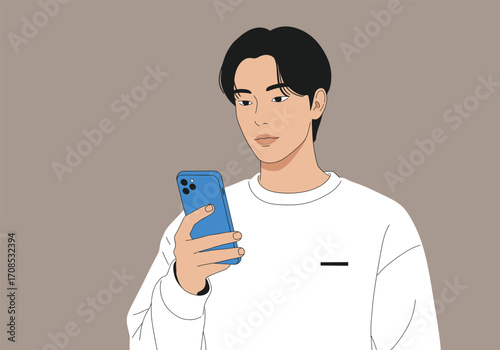 A young man with black hair is looking at his blue smartphone, wearing a white sweatshirt, showcasing modern communication and technology in a casual setting
