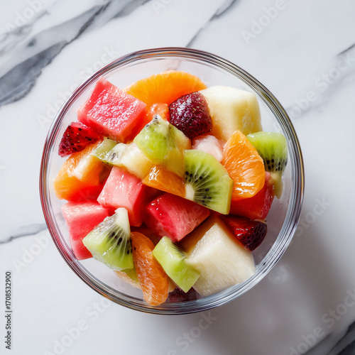 Top View of Colorful Fruit Salad in Glass Bowl