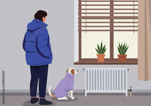 A woman in a blue puffer jacket stands next to a dog wearing a purple sweater in a room with a radiator and a window with plants, creating a cozy and warm indoor scene, showcasing winter attire