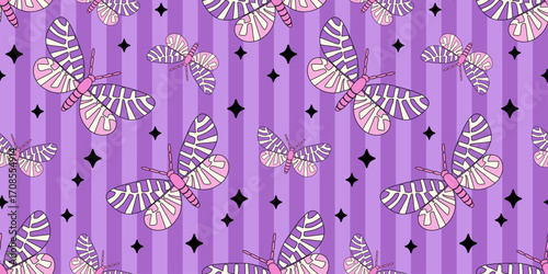Seamless Halloween pattern with pastel goth moths and black stars on a purple striped background. Spooky yet whimsical design perfect for textiles, wrapping paper, wallpapers, autumn holiday designs.