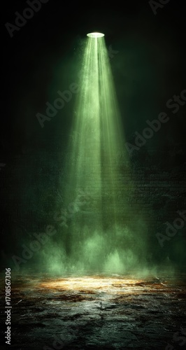 Green spotlight on dark stage