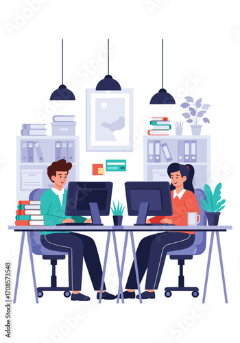 Two colleagues working together on computers in an office space.