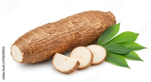 Cassava root with slices and leaves
