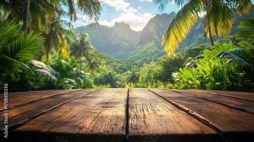 Wooden table overlooking lush tropical valley