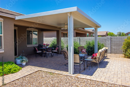 Rear Yard Pergola Covering Patio Furniture