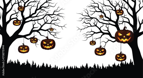 Spooky Halloween pumpkins hang from silhouetted trees on a dark night