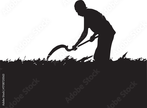 Silhouette of a farmer harvesting crops with a sickle in a field