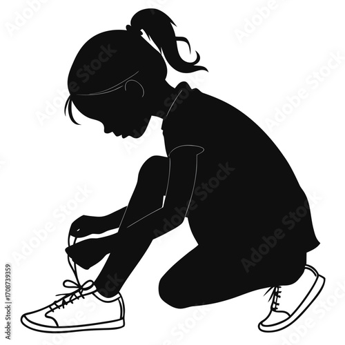 Girl tying shoelace