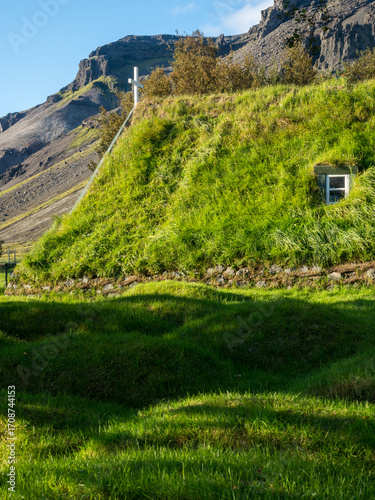 Green roof of traditional turf church in Hof, Iceland