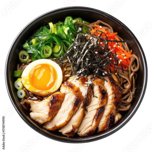 Delicious Chicken Ramen Bowl with Soft Boiled Egg, Fresh Vegetables, and Seaweed Garnish on transparent background