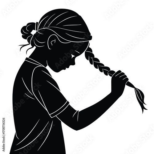 Girl braiding her own hair