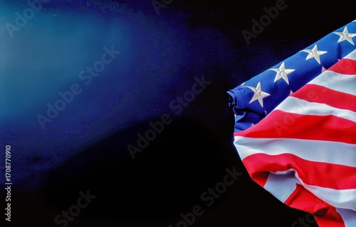 Waving American Flag With Stars and Stripes Against a Dark Background