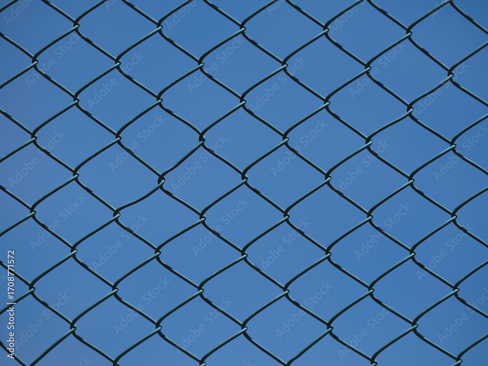 Fototapeta premium barrier wires under bright sky