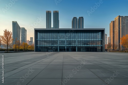 Modern Architecture Stands out Against a Clear Sky in a Cityscape During Late...
