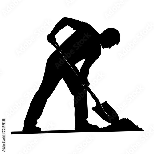 Silhouette of a man digging a shovel, the hard work determination in digging