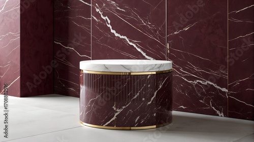 Luxurious dark red marble side table with gold accents and white marble top