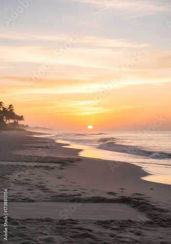 Golden hues illuminate a tranquil tropical coastline as the sun rises, casting a warm glow over gentle ocean waves breaking softly on the pristine sandy beach, inviting a serene start to the day