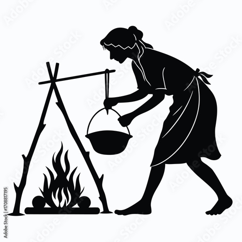 Woman cooking in open fire