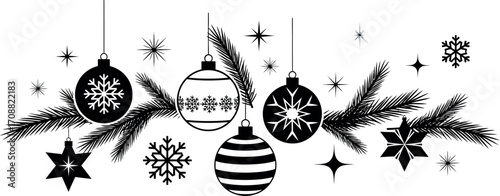 Festive Christmas ornaments and pine branches adorned with snowflakes and stars