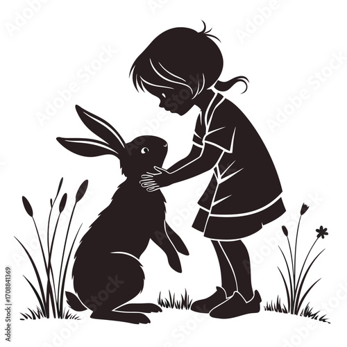 Child hugging rabbit