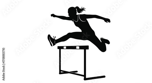 Athletic woman silhouette leaping over a hurdle during a race, showcasing speed and determination.