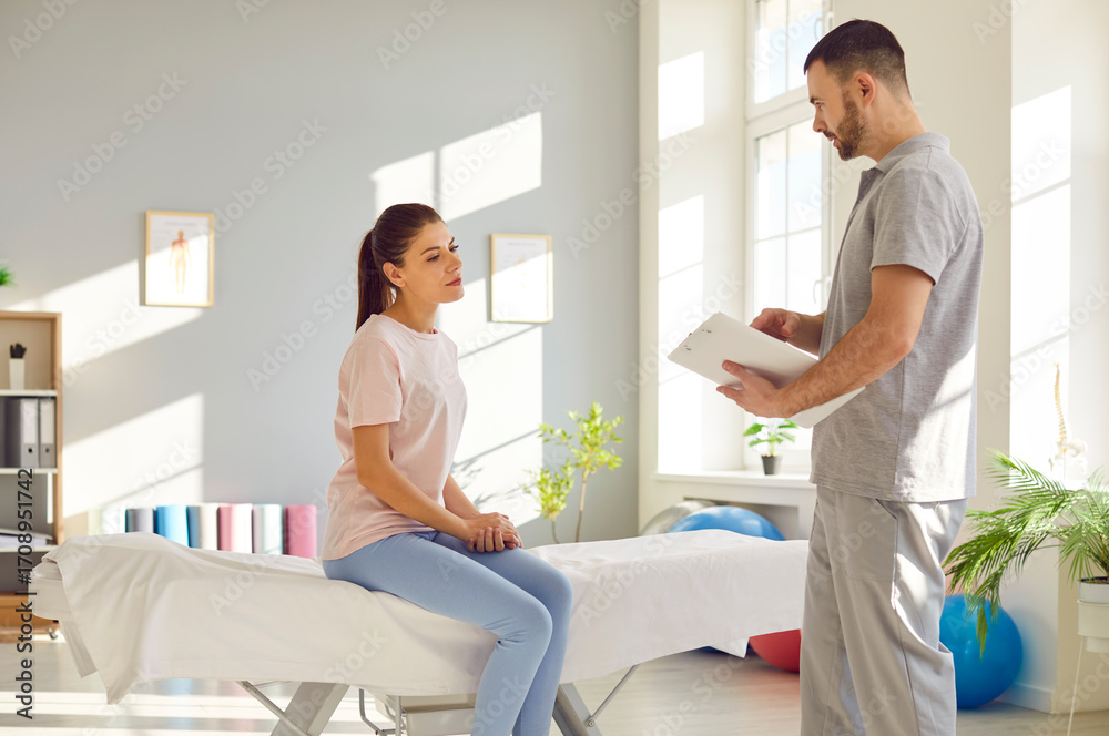 Obraz premium Consultation for manual therapy rehabilitation, massage, male physical therapist in therapy medical clinic room. Female patient med coach sitting to reduce disability, pain, get body health, wellness