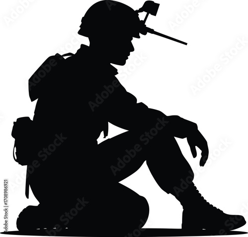 Soldier kneeling in full combat gear silhouette design