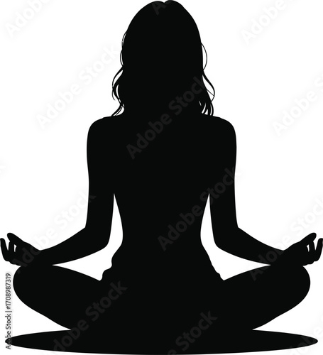 Woman meditating in peaceful lotus position silhouette