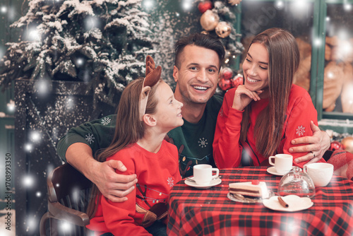 Happy young family in outdo...