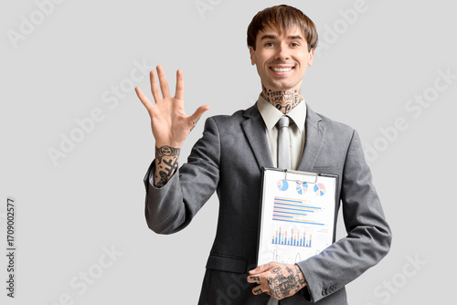 Young businessman with clip...