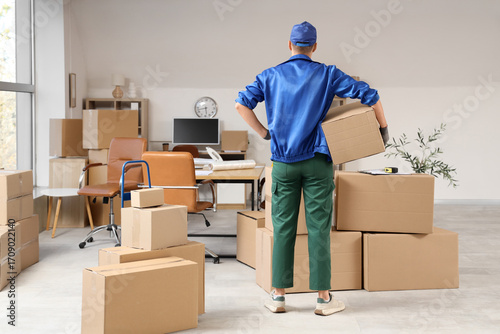 Male loader with cardboard ...