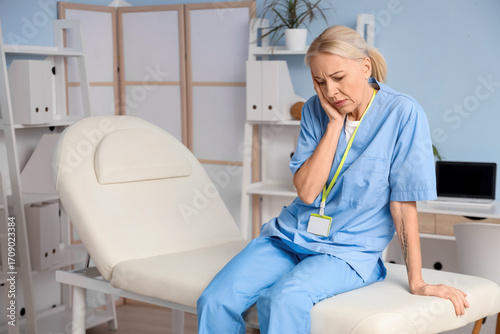 Worried female physiotherap...
