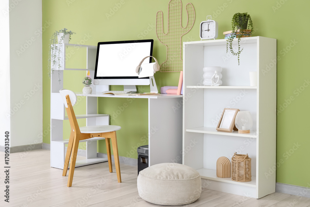 Obraz premium Interior of office with inventor's workplace and shelf unit