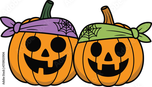 Two smiling jack o lanterns with spider webs halloween