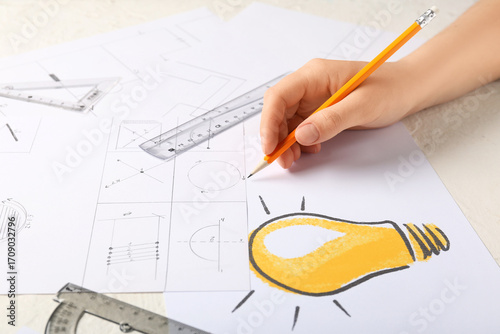 Female hand drawing light b...