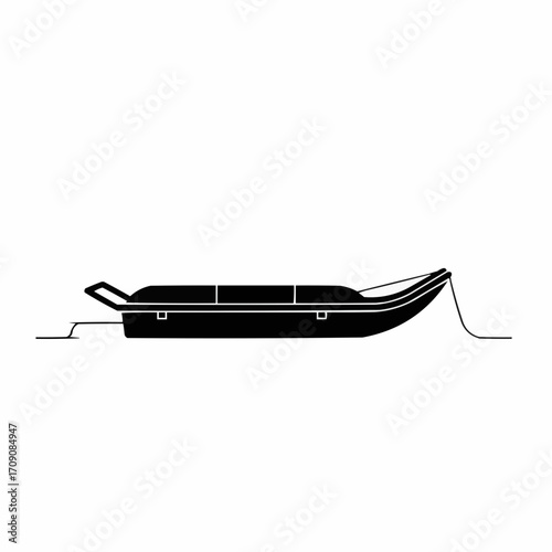 Silhouette of a sleek black sled with a curved front and tow rope