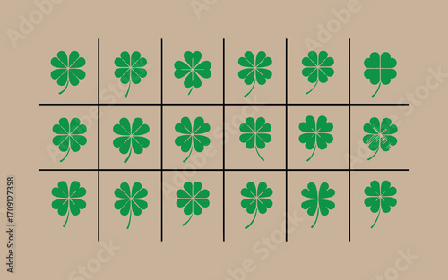 Green four leaf clovers arranged in a grid pattern on brown background