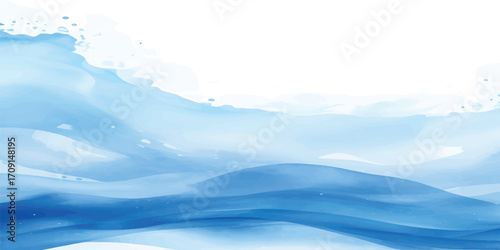Abstract ocean blue water waves reflecting the morning sky and distant snowy mountains on the horizon