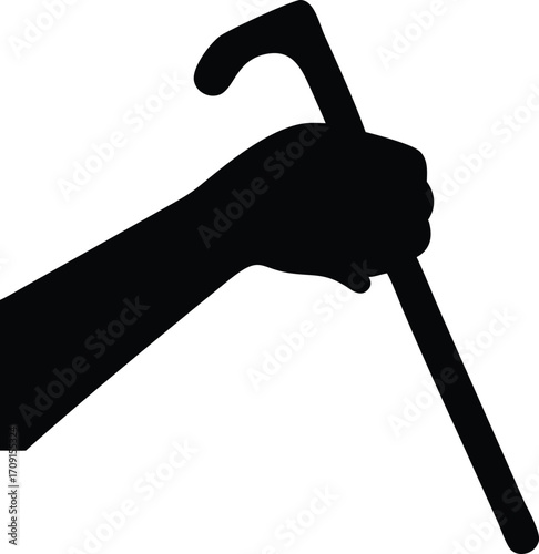 Silhouette of a human hand firmly gripping a walking cane in a gesture of support and mobility