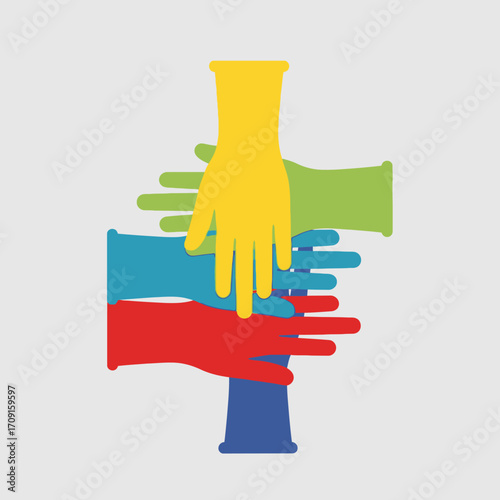 Flat lay image of four hands forming a colorful cross, symbolizing unity and teamwork, against a simple gray background with a vibrant, optimistic mood.