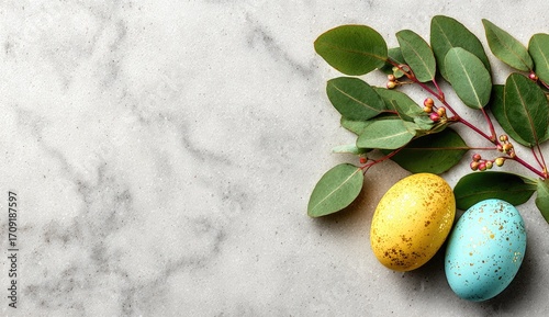 Easter eggs & eucalyptus on marble