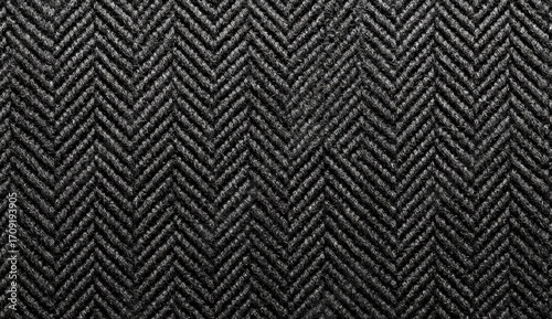 Close-up of dark gray herringbone textile
