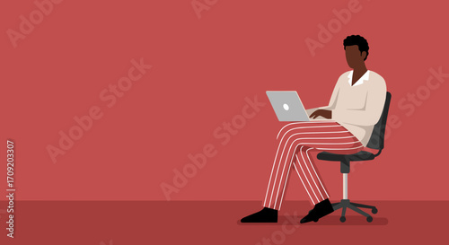 Relaxed man uses laptop on a bean bag chair outdoors by water, symbolizing remote work, digital freedom, and modern lifestyle balance.