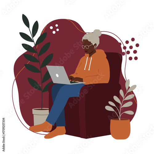 Senior person focused on their laptop outdoors, embodying remote work, digital learning, and a relaxed modern lifestyle. Perfect for themes of technology and active seniors.